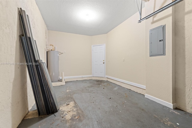 garage featuring gas water heater, electric panel, and baseboards