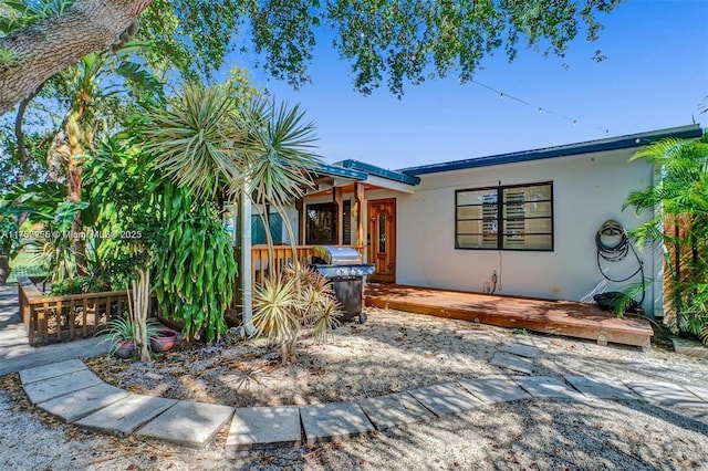 view of front of home featuring stucco siding