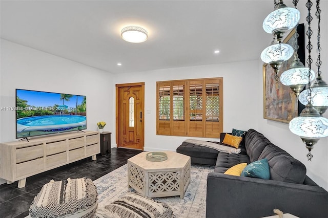 living area with recessed lighting and baseboards