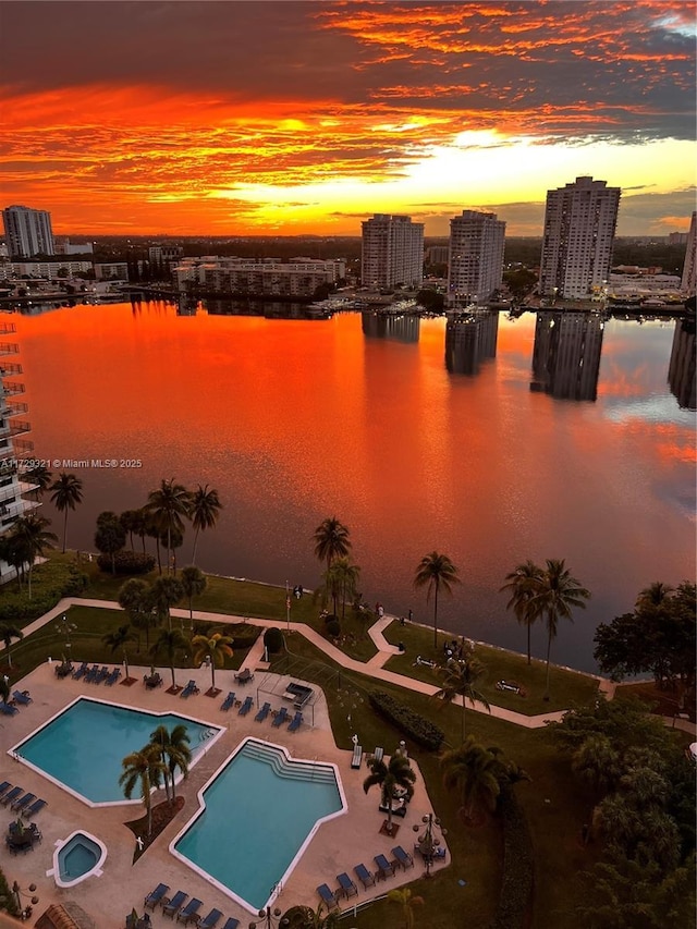 bird's eye view with a view of city and a water view