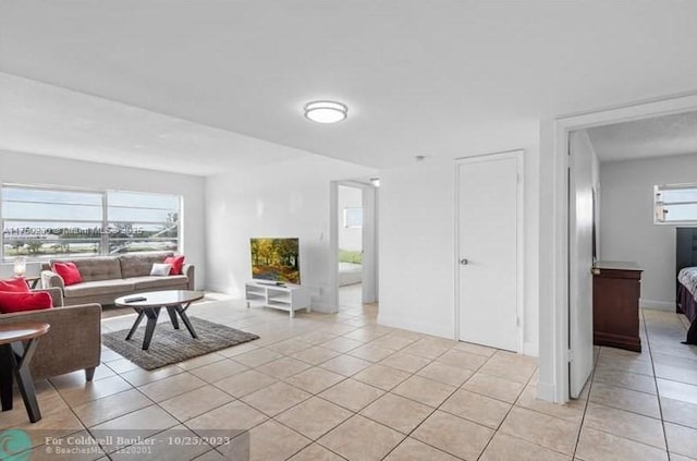 living room featuring light tile patterned floors