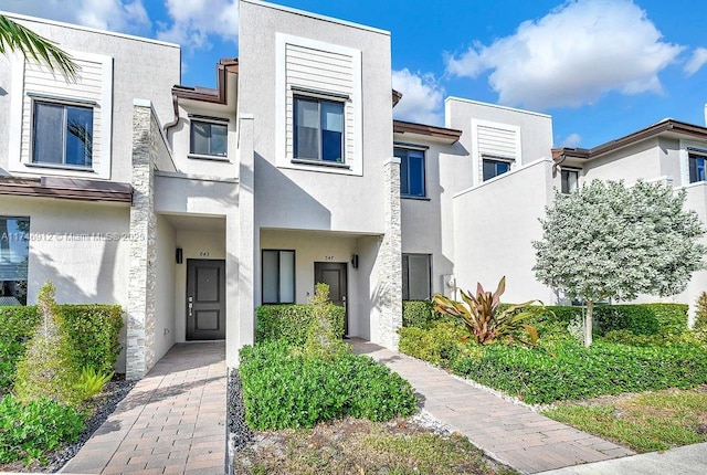 view of property featuring stucco siding