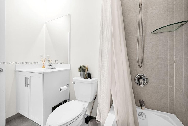 bathroom with vanity, toilet, and shower / tub combo with curtain