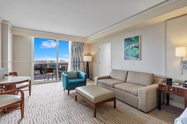 living room with light carpet, baseboards, and crown molding