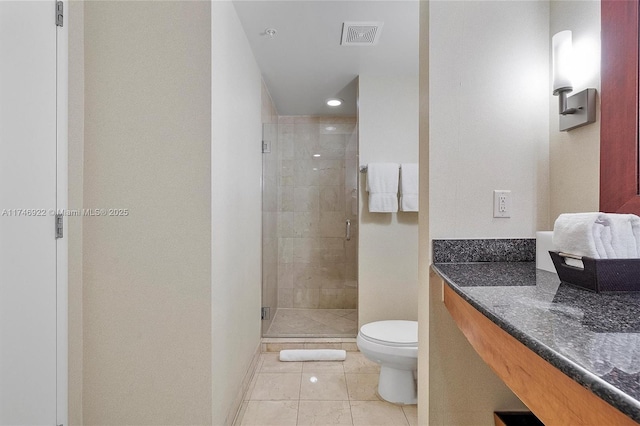 full bathroom featuring visible vents, toilet, tile patterned floors, vanity, and a shower stall