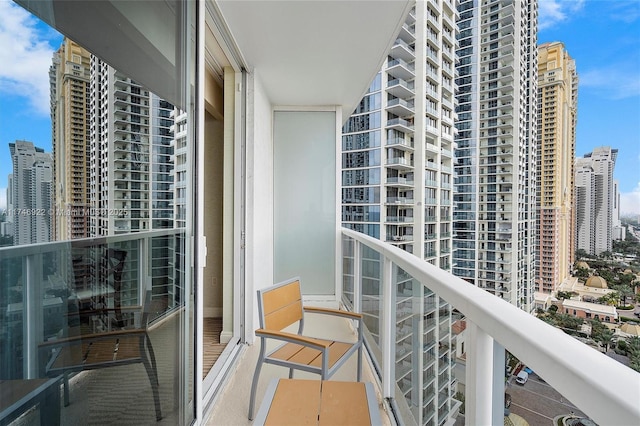 balcony featuring a city view