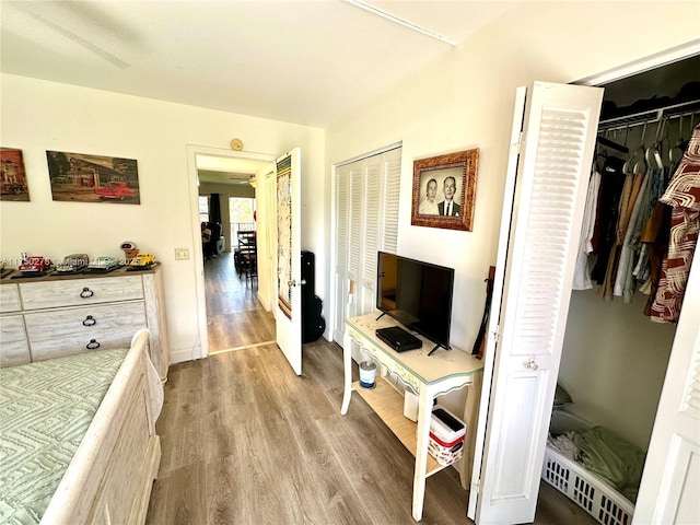 bedroom featuring light wood-style floors