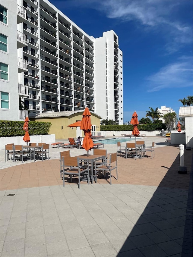 view of patio / terrace featuring a community pool