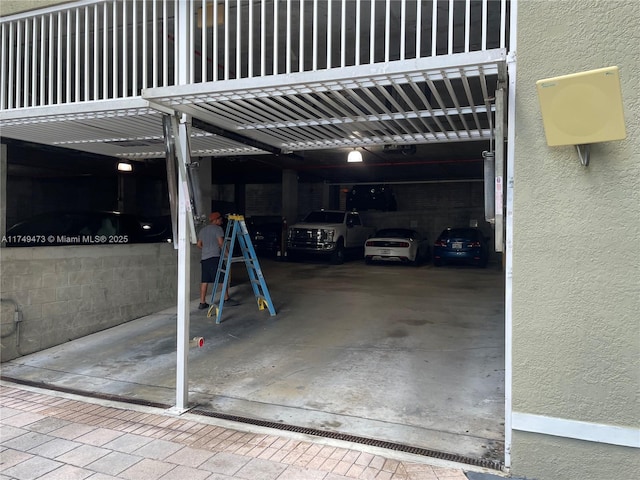 garage with a carport