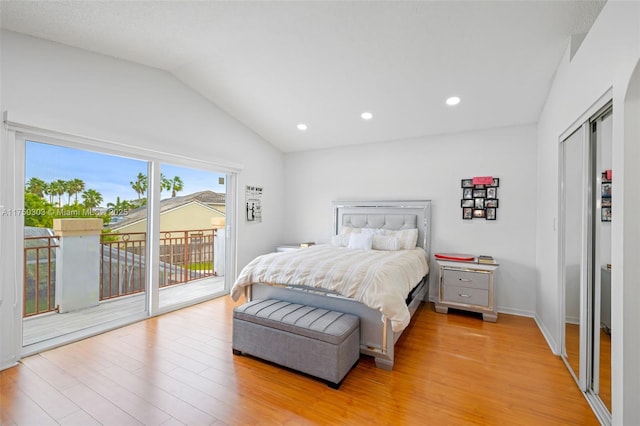 bedroom featuring lofted ceiling, access to exterior, light wood-type flooring, a closet, and recessed lighting