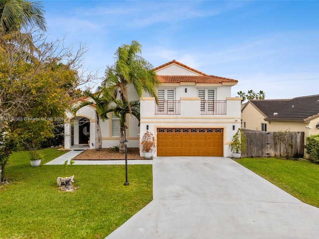 mediterranean / spanish-style house with a balcony, driveway, fence, and a front lawn