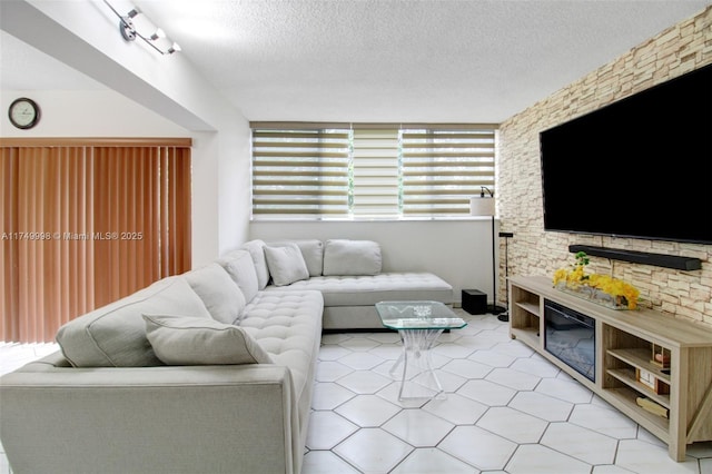 living room with a textured ceiling