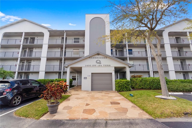 view of property with uncovered parking