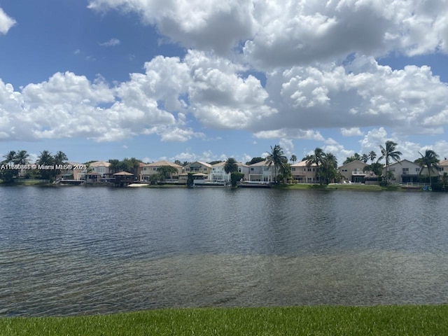 view of water feature with a residential view