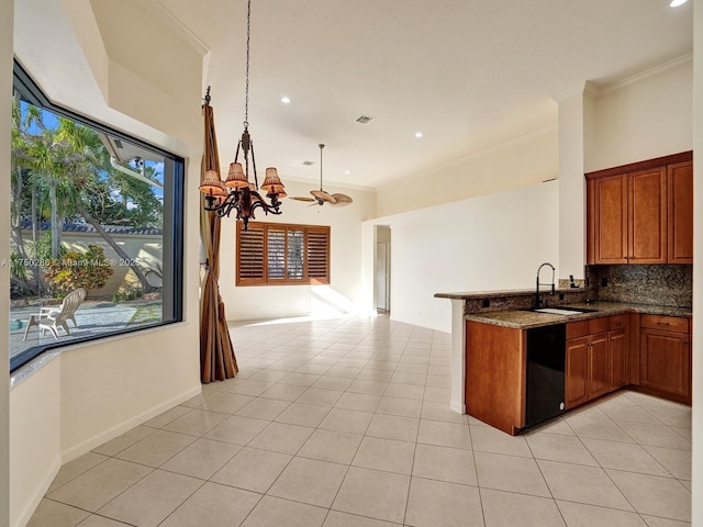 kitchen featuring black dishwasher, brown cabinets, ornamental molding, open floor plan, and a sink