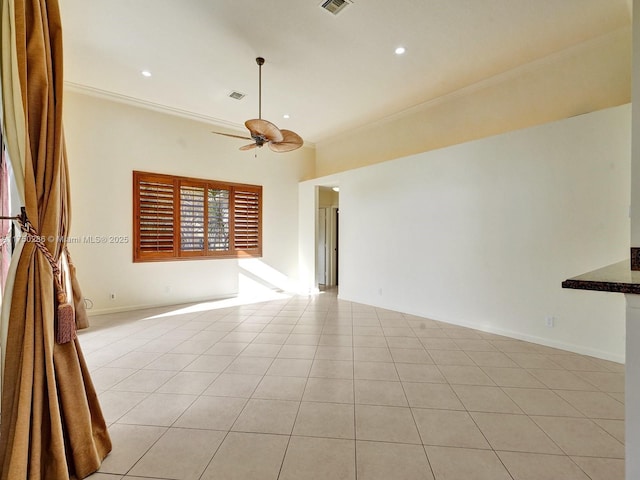 spare room with light tile patterned floors, visible vents, a ceiling fan, crown molding, and recessed lighting