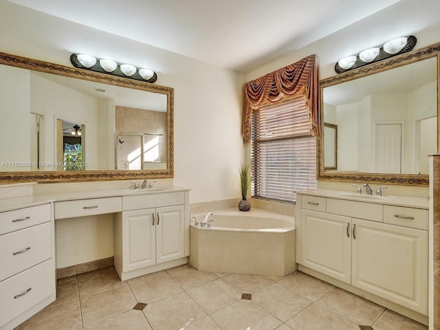 bathroom with two vanities, a sink, and a shower stall