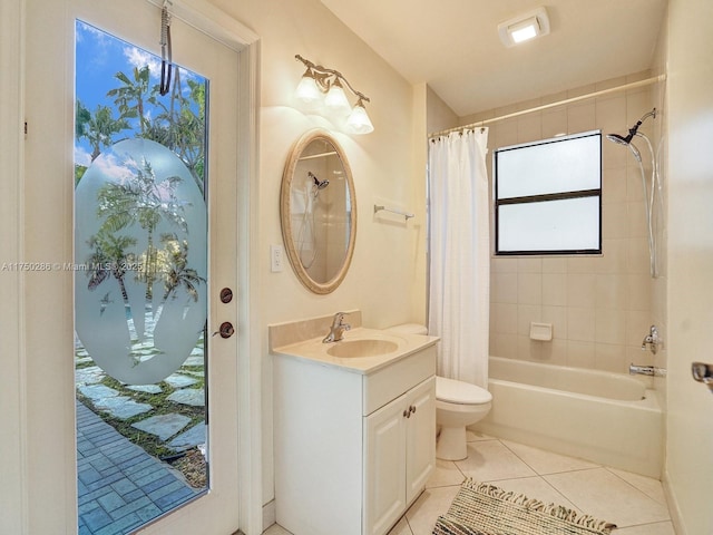 bathroom with toilet, tile patterned flooring, shower / bathtub combination with curtain, and vanity