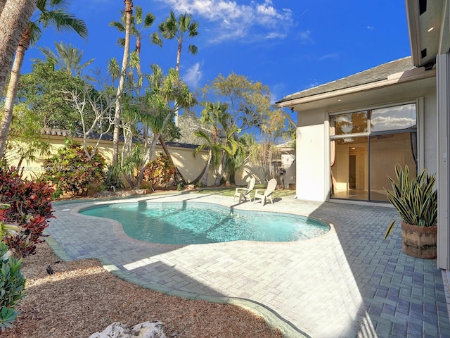 pool with a patio