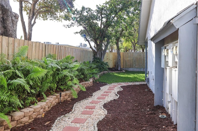 view of yard with a fenced backyard