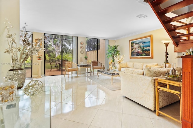 9943 Costa Del Sol Blvd Unit B-108A, Doral, FL 33178 - living room featuring light tile patterned floors and crown molding