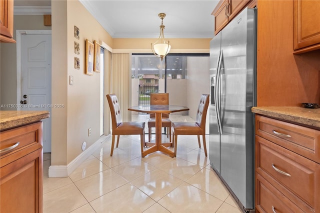 9943 Costa Del Sol Blvd Unit B-108A, Doral, FL 33178 - dining room with ornamental molding and light tile patterned floors