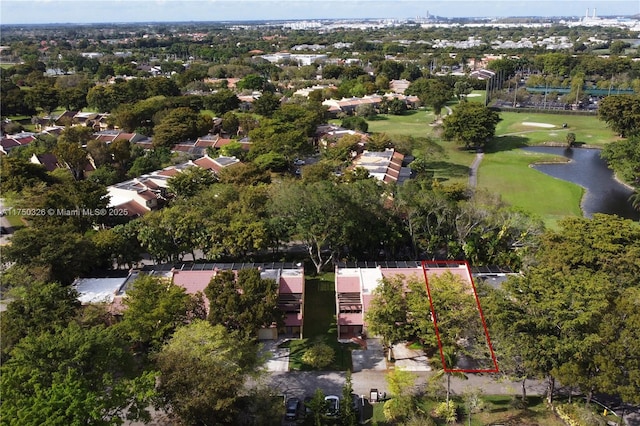 bird's eye view featuring a water view and a residential view