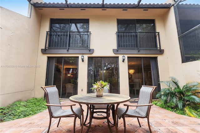 9943 Costa Del Sol Blvd Unit B-108A, Doral, FL 33178 - patio / terrace featuring a patio and outdoor dining area