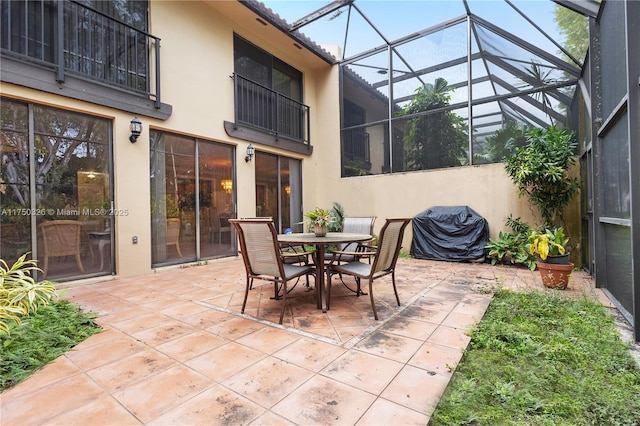 9943 Costa Del Sol Blvd Unit B-108A, Doral, FL 33178 - view of patio with grilling area and a lanai