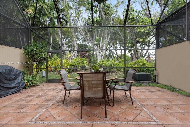 9943 Costa Del Sol Blvd Unit B-108A, Doral, FL 33178 - view of patio featuring glass enclosure and outdoor dining area