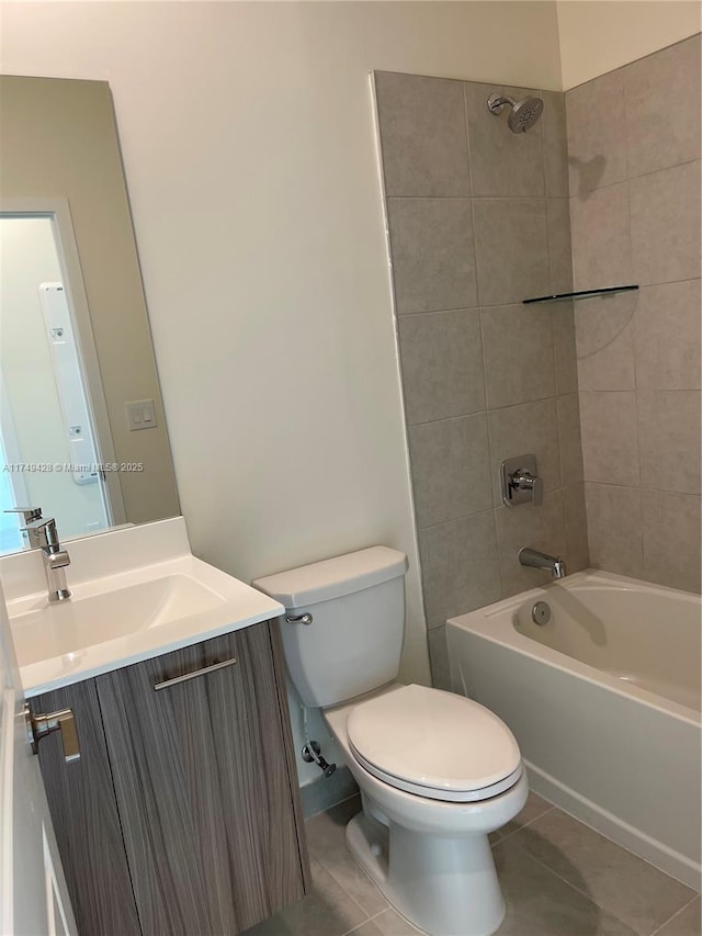 full bathroom featuring shower / bath combination, vanity, toilet, and tile patterned floors