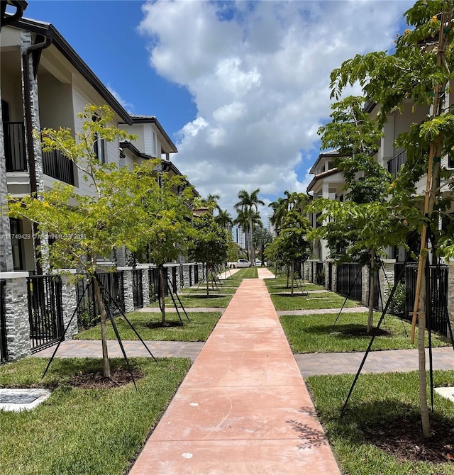 view of community with a lawn