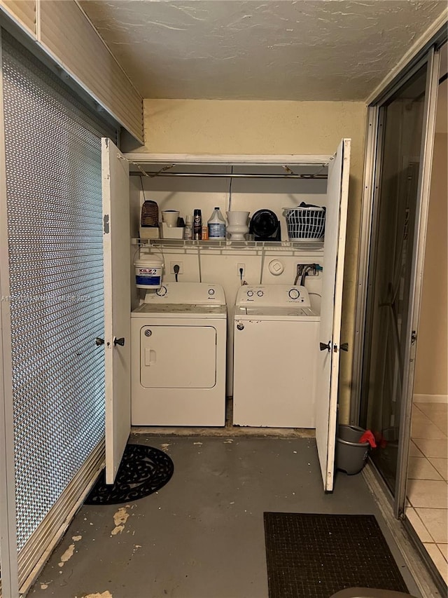 laundry room featuring laundry area and washer and clothes dryer