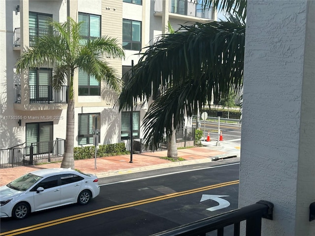 view of road featuring sidewalks and curbs