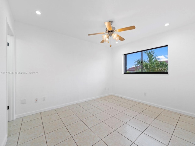 empty room featuring baseboards, a ceiling fan, and recessed lighting