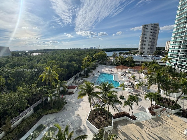 view of swimming pool with a city view