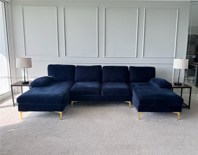 living room featuring light colored carpet