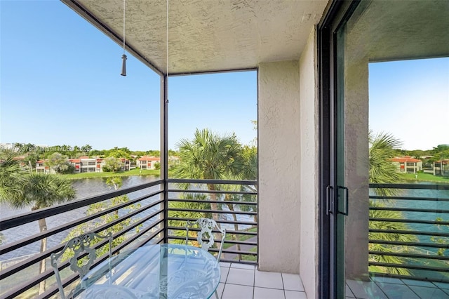 balcony featuring a water view