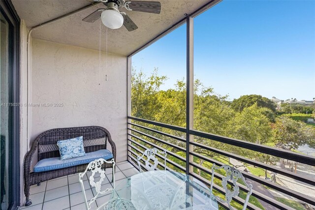 balcony featuring a ceiling fan