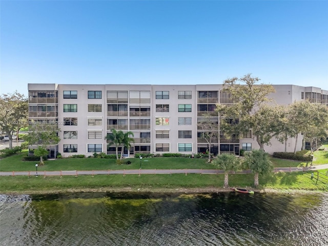 view of property with a water view