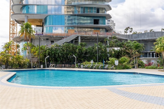 community pool with a patio