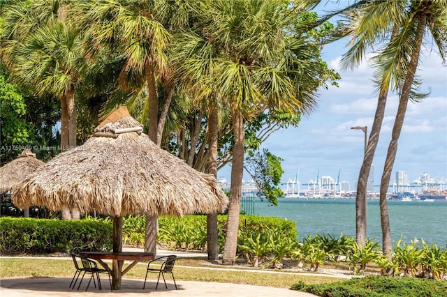 view of community featuring a water view and a gazebo