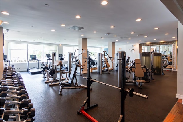 workout area with a wealth of natural light and recessed lighting