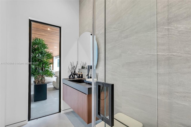 interior space with concrete flooring and vanity