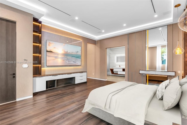 bedroom featuring wood finished floors and recessed lighting