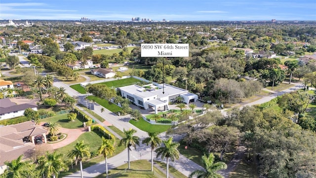 birds eye view of property with a residential view