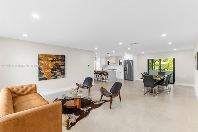 22274 SW 61st Ave, Boca Raton, FL 33428 - living area with recessed lighting and light tile patterned flooring