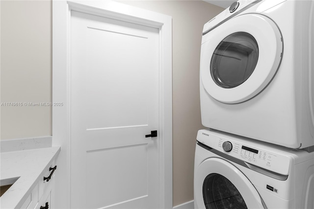 22274 SW 61st Ave, Boca Raton, FL 33428 - laundry room with stacked washing machine and dryer and cabinet space