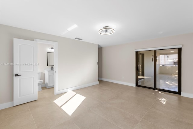 22274 SW 61st Ave, Boca Raton, FL 33428 - unfurnished room with baseboards and light tile patterned floors