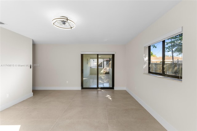 22274 SW 61st Ave, Boca Raton, FL 33428 - unfurnished room with tile patterned floors and baseboards